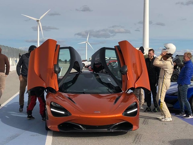 A black and orange luxury car